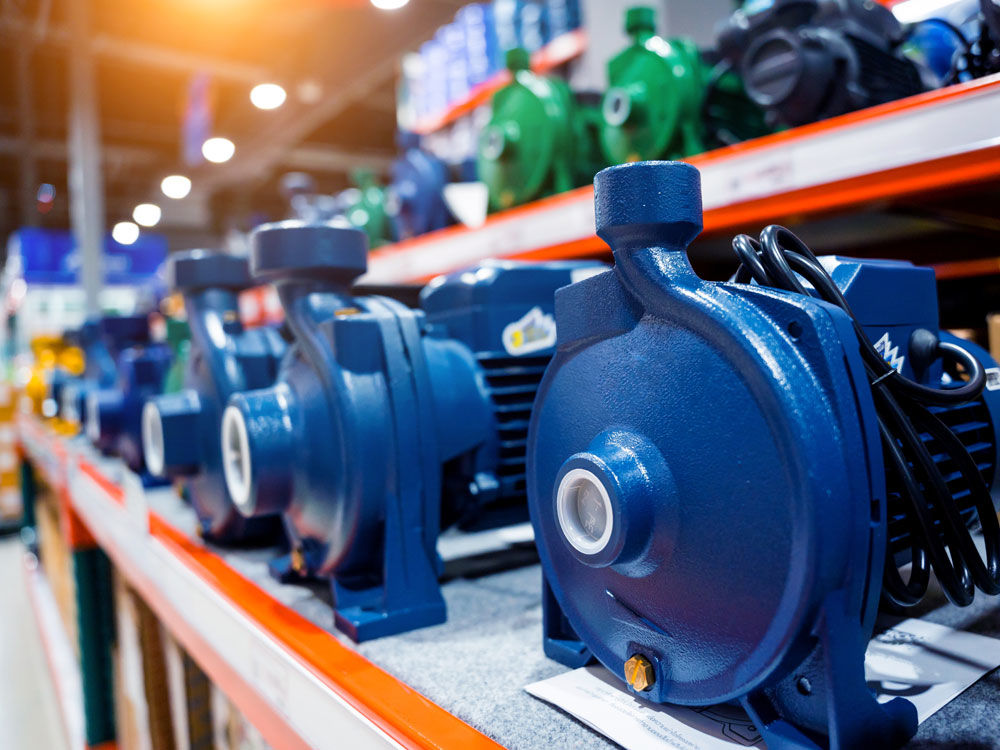 a photo of a row of centrifugal pumps.